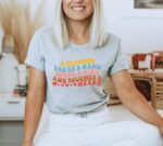 A Teacher Takes A Hand  T-shirt | Graphic Tee