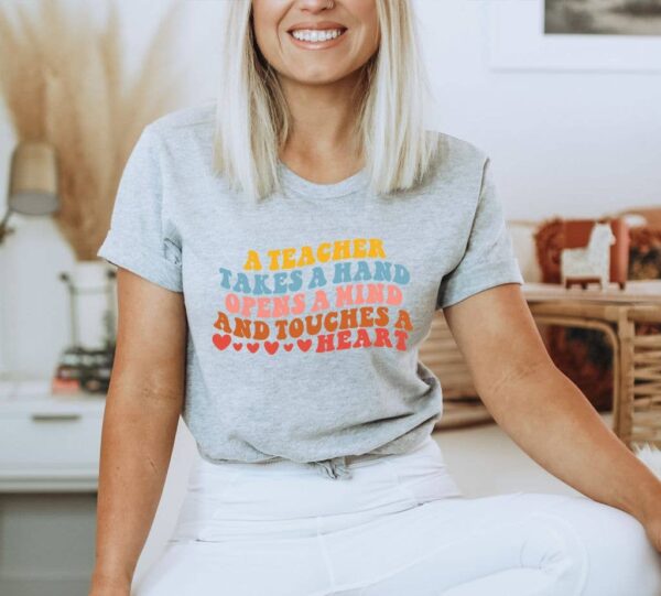 A Teacher Takes A Hand  T-shirt | Graphic Tee
